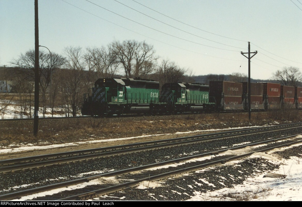 Stack train rolls west